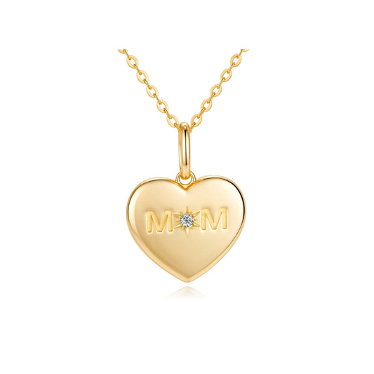 Gold heart-shaped pendant with 'MOM' engraving from SKADIS jewelry