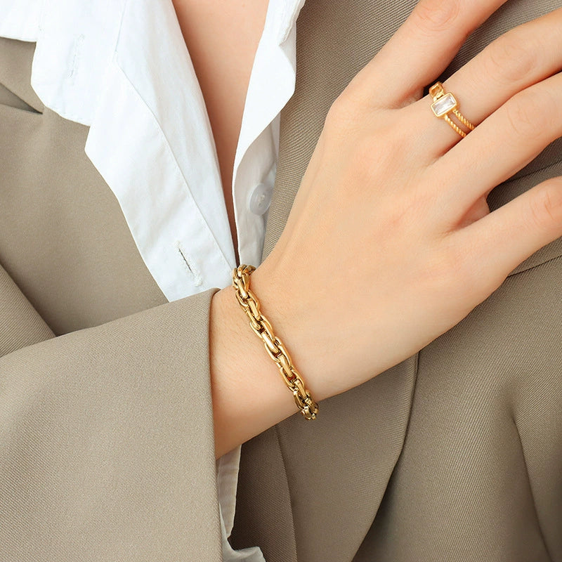 Goldplated bracelet on a wrist from SKADIS Jewelry