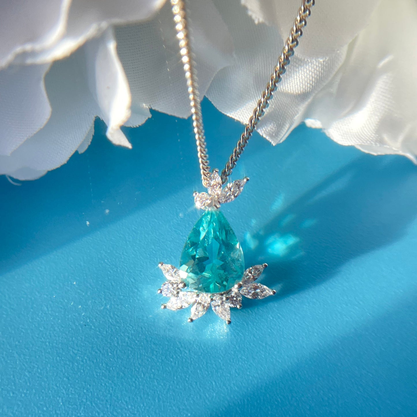 Lotus inspired design,18k white gold Blue Apatite diamond pendant from SKADIS Jewelry Copenhagen.