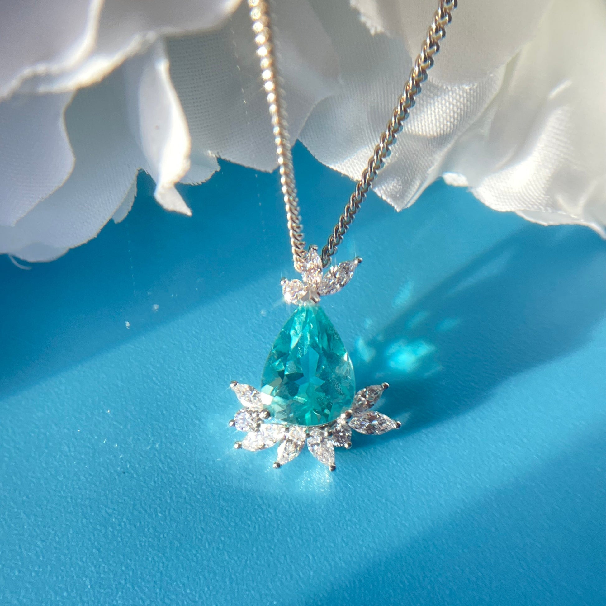 Lotus inspired design,18k white gold Blue Apatite diamond pendant from SKADIS Jewelry Copenhagen.