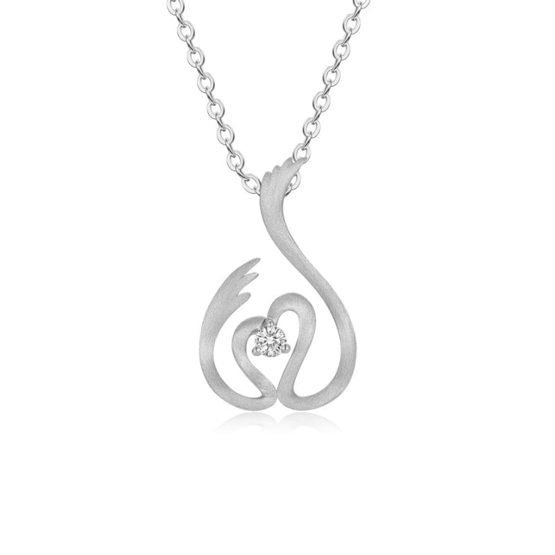 DANCING SWAN diamond pendant on model, 18k white gold