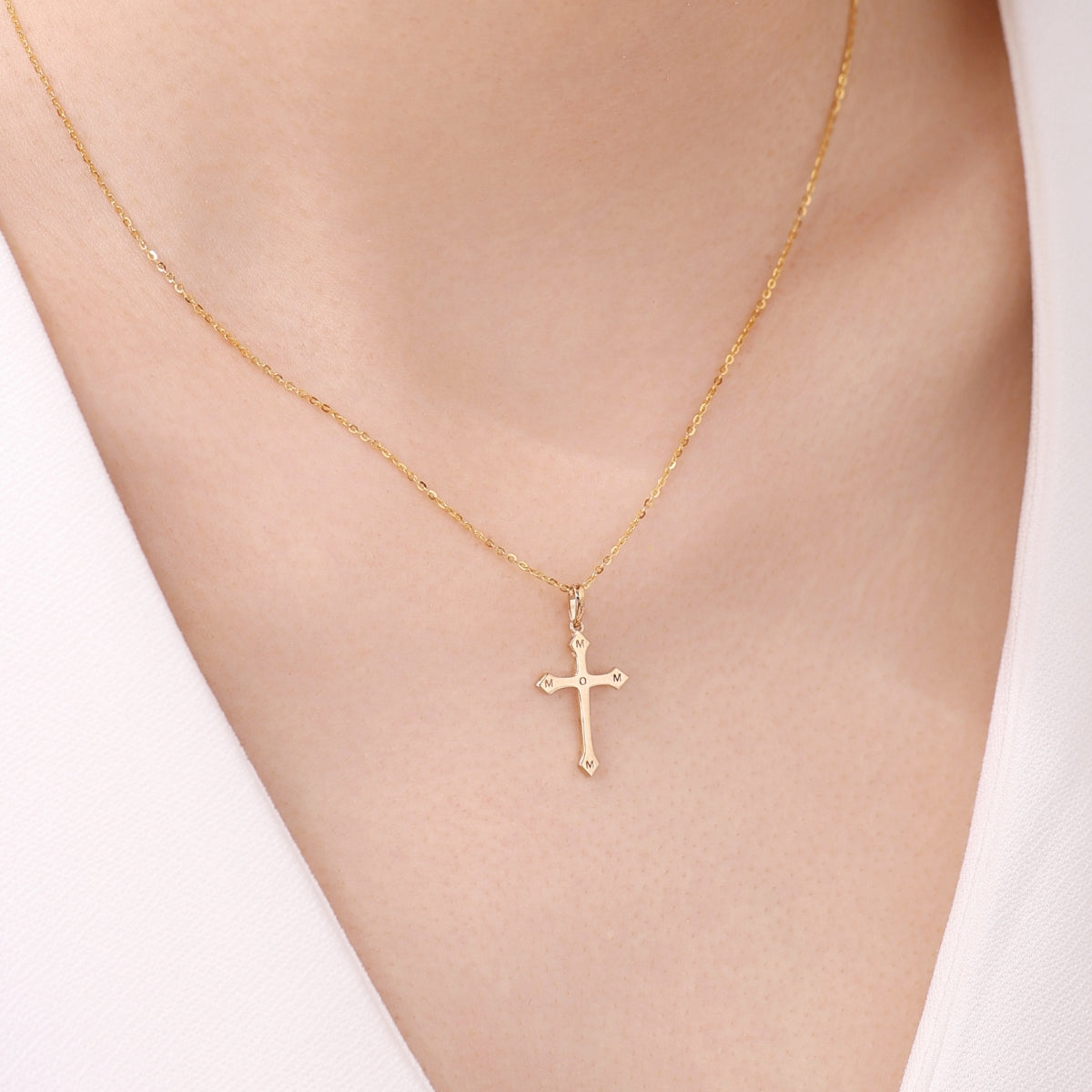 Gold cross necklace with MOM & DAD engraving from SKADIS Jewelry