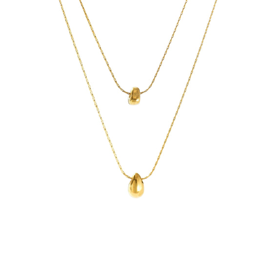 Two gold necklaces with teardrop pendants from SKADIS Jewelry