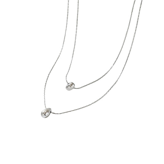 Modern necklace with small pendants from SKADIS Jewelry