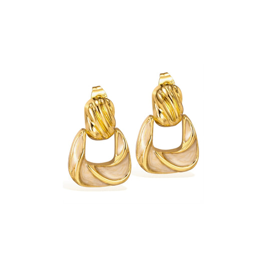 Pair of gold hoop earrings from SKADIS Jewelry