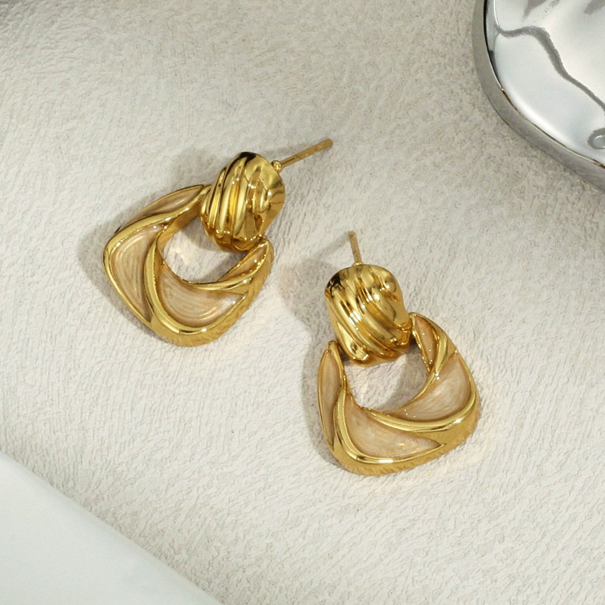 Gold hoop earrings from SKADIS Jewelry