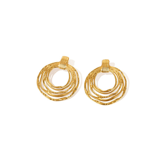 Pair of gold hoop earrings from SKADIS Jewelry