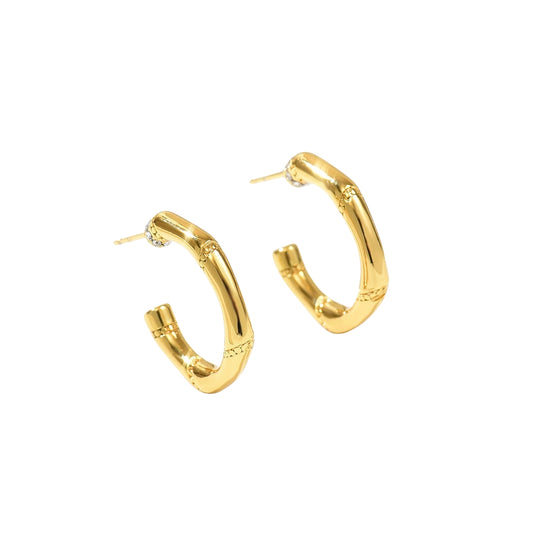Gold hoop earrings from SKADIS Jewelry
