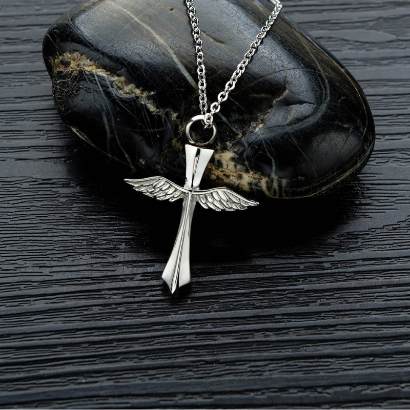 Silver cross pendant with wings from SKADIS Jewelry