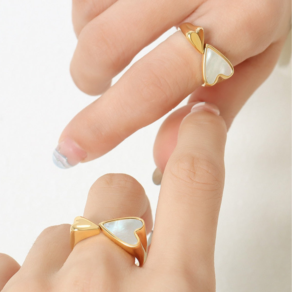 Gold rings with heart-shaped shell from SKADIS Jewelry