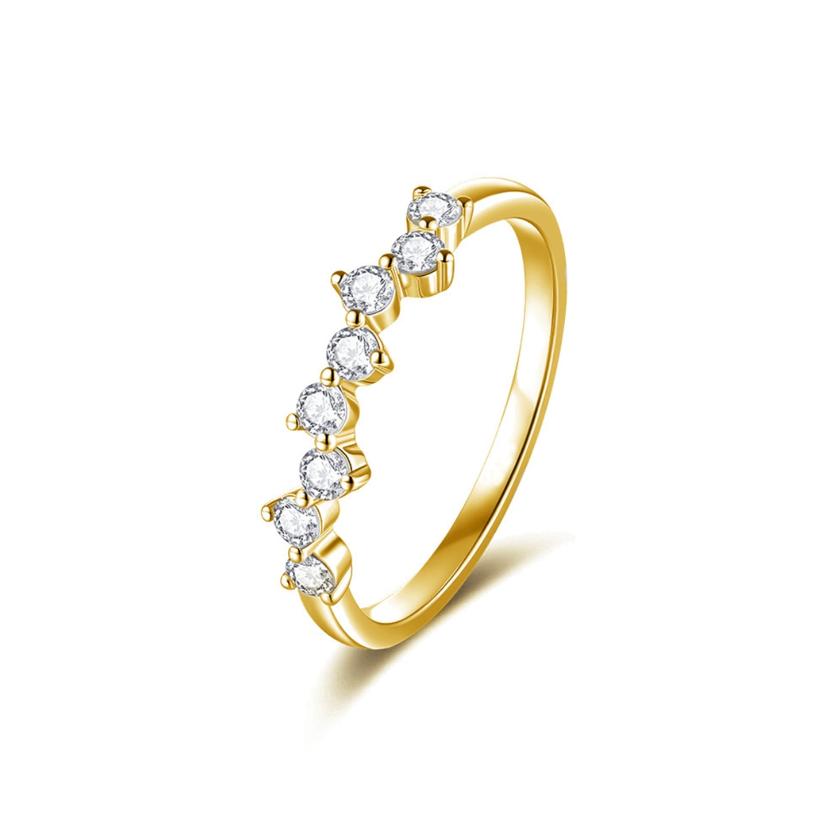 A band diamond ring with multiple diamonds set in 18k yellow gold.
