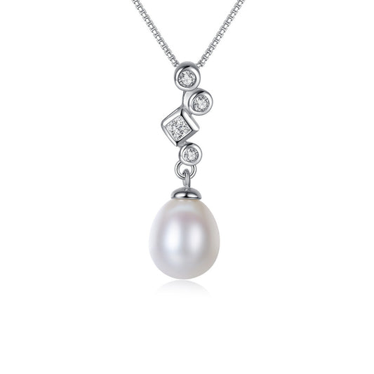 Pearl necklace with zirconia on a white background.