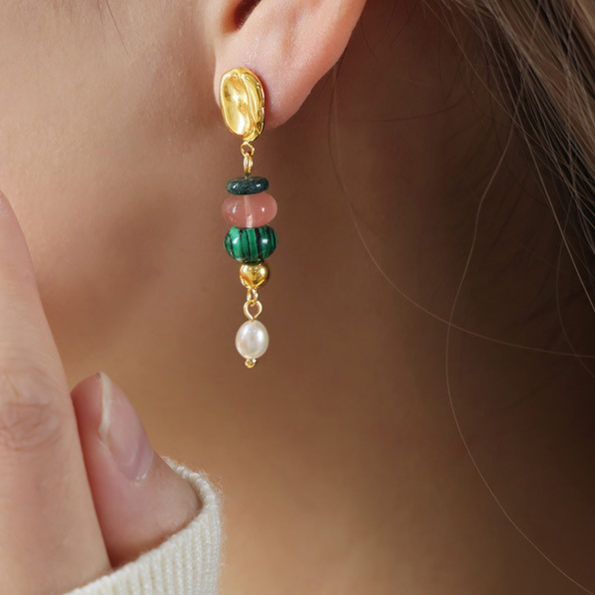 Close-up of an earring with colorful beads  from SKADIS Jewelry