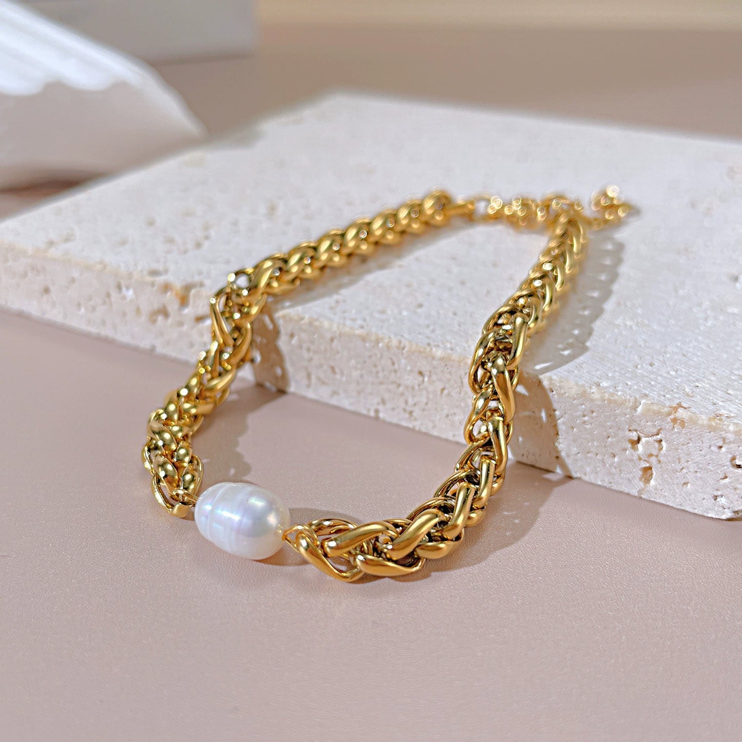 Gold chain bracelet with a pearl from SKADIS Jewelry