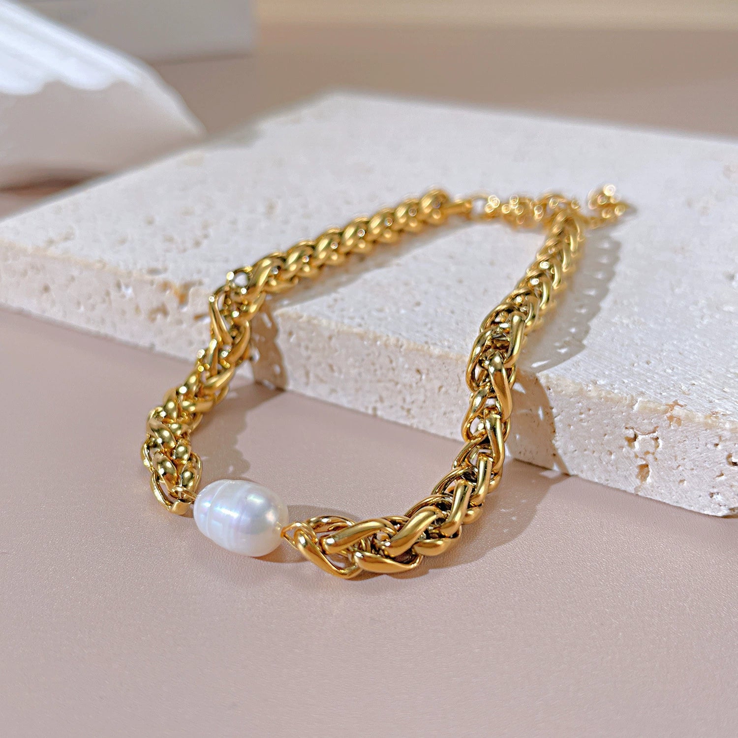 Gold chain bracelet with a pearl from SKADIS Jewelry