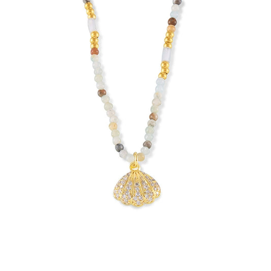 Necklace with a gold shell pendant from SKADIS Jewelry