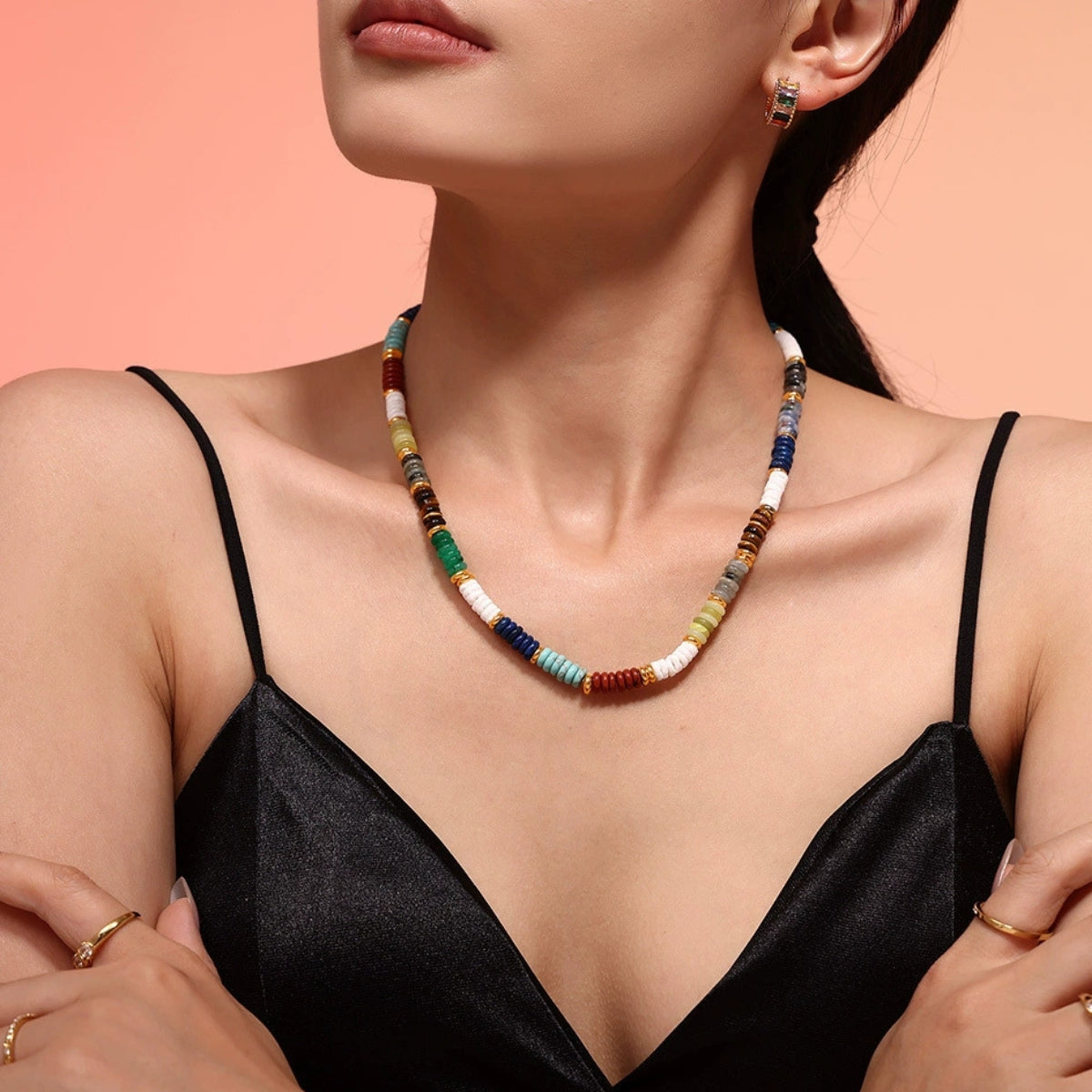 Woman wearing a colorful beaded necklace - SKADIS Jewelry