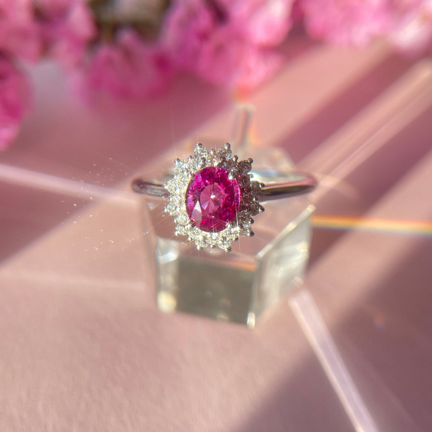Natual Ruby ring with sparkling diamonds in 18k white gold from SKADIS Jewelry Copenhagen.
