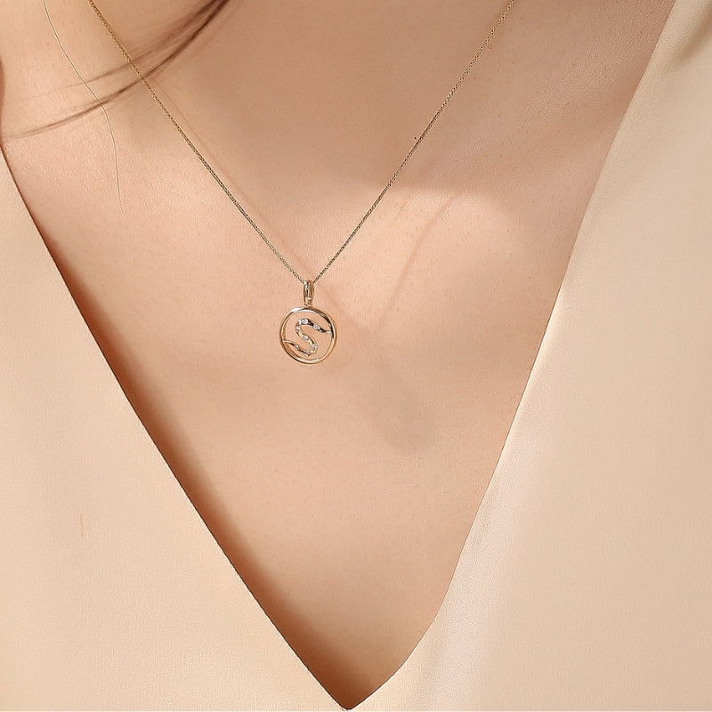 SKADI diamond pendant on model, 18k white gold