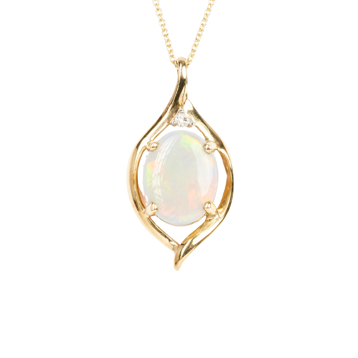 14k Opal pendant with natural diamond.