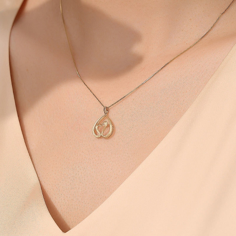 SKADIS SWAN HEART pendant, 18k gold