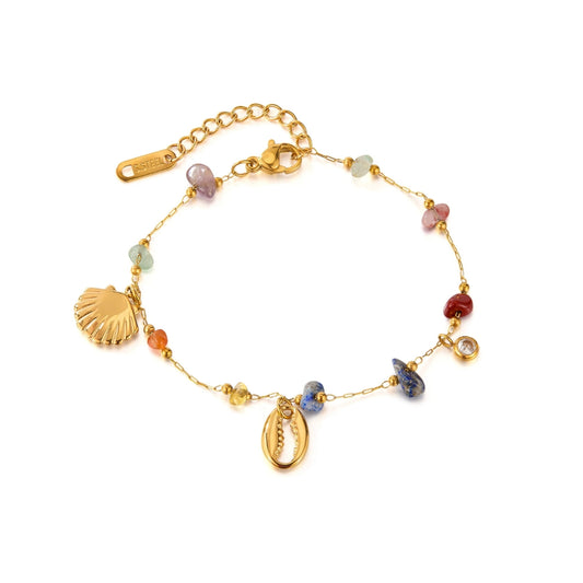 Gold bracelet with shell and bead charms from SKADIS Jewelry