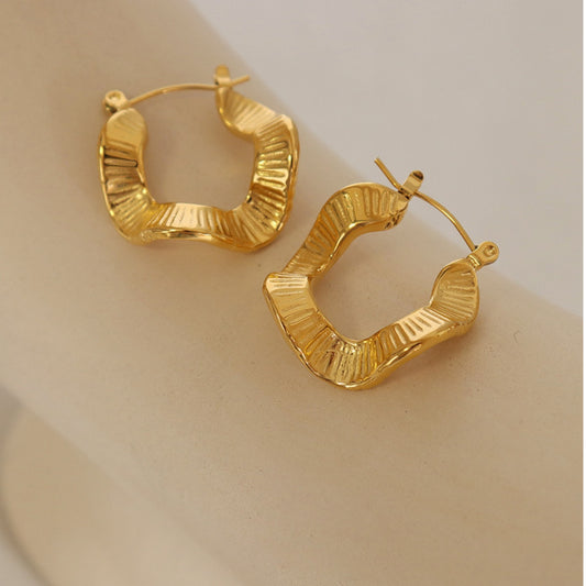 Stylish gold-plated earrings from SKADIS Jewelry