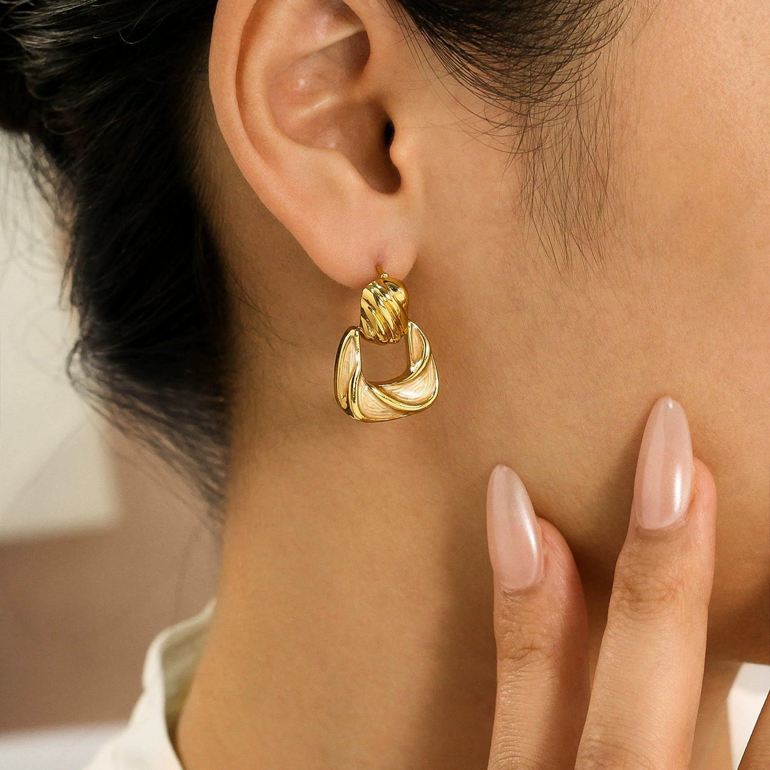 Gold earring with enamel from SKADIS Jewelry