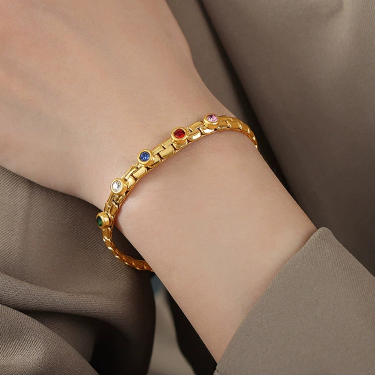 Gold bracelet with colorful zirconia from SKADIS Jewelry
