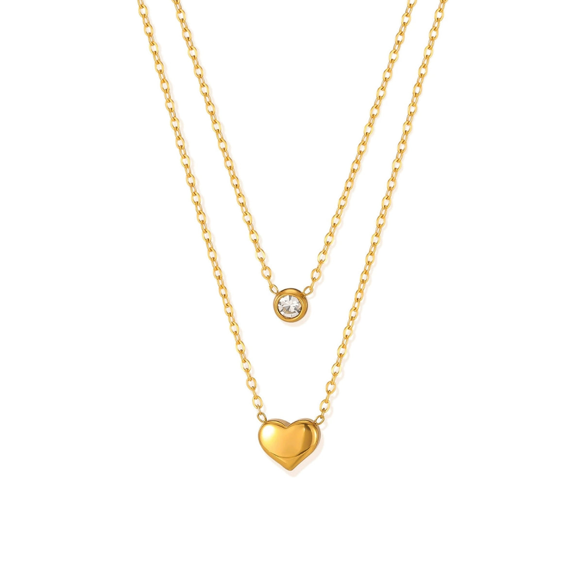 Gold necklace with heart pendant and small round pendant from SKADIS Jewelry
