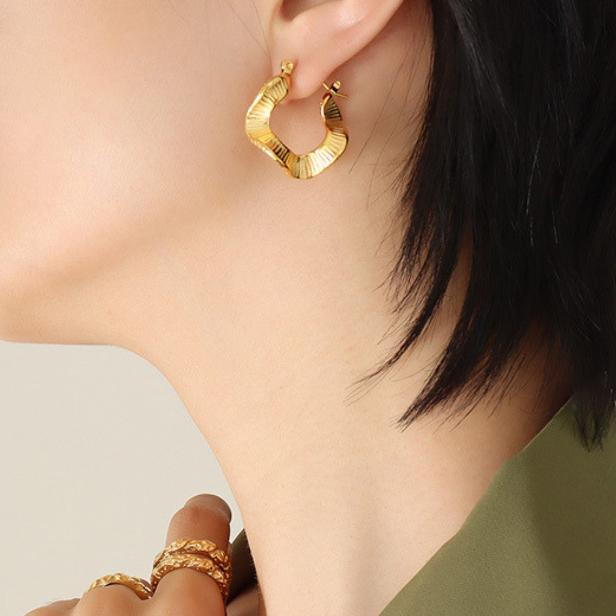 Gold hoop earrings from SKADIS Jewelry