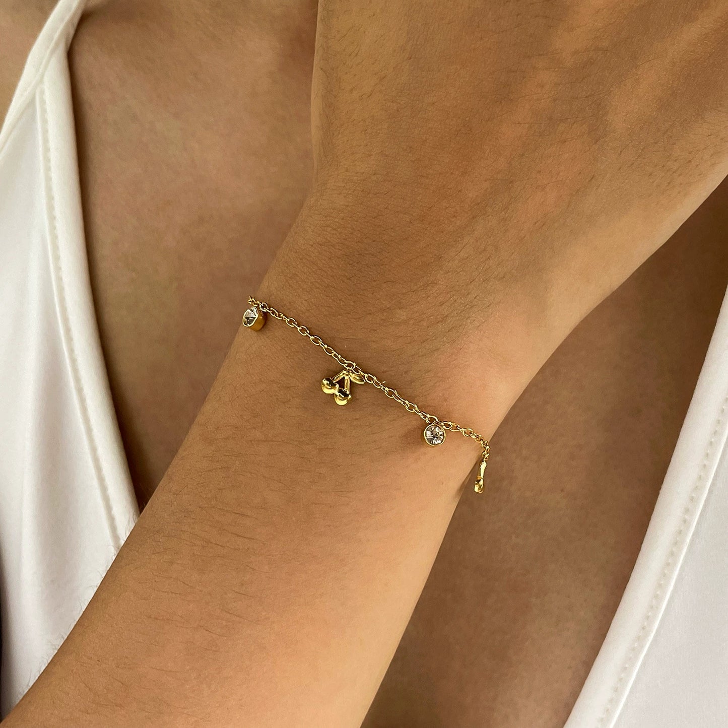 Gold-plated armband with charms from SKADIS Jewelry