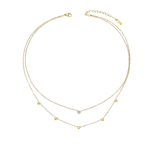 Gold necklace with heart-shaped pendants from SKADIS Jewelry
